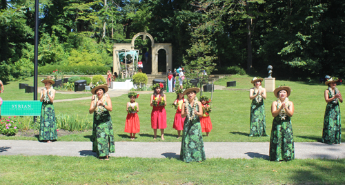 Pacific Paradise dancers in front of Syrian Garden